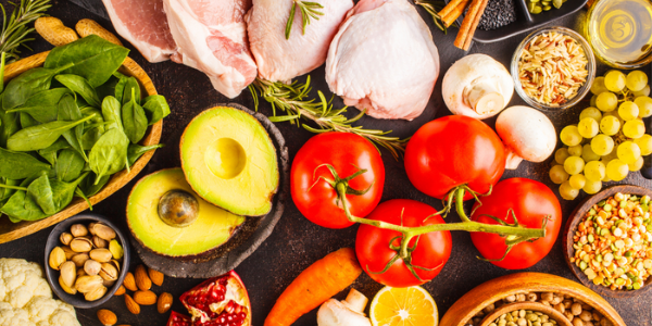 A large array of colorful food on a table.