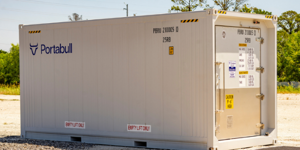 A large Portabull electric reefer sitting outside.
